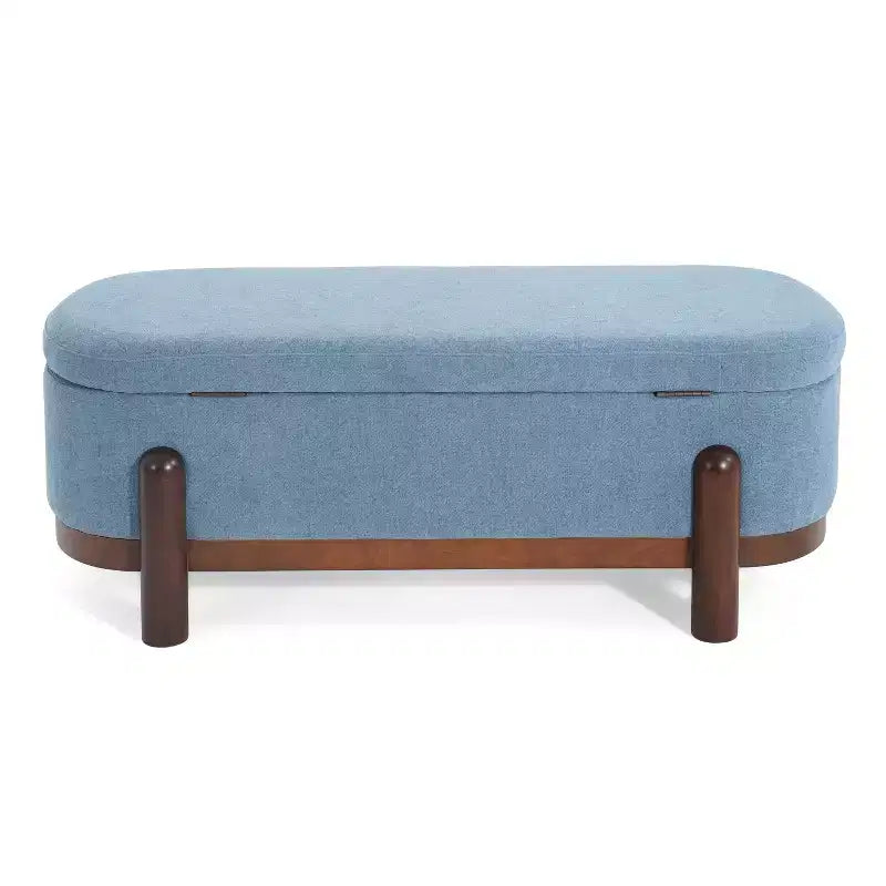 Ottoman de rangement ovale moderne en tissu Leroy avec pieds en bois massif